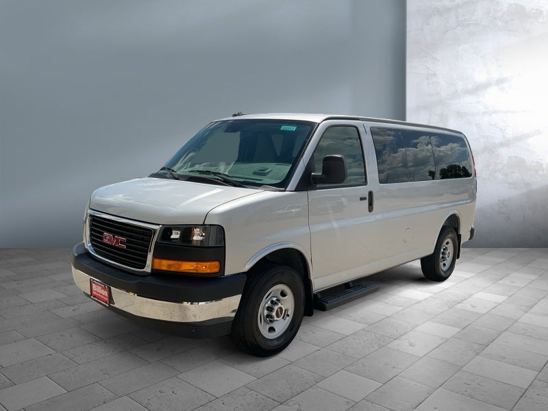 2026 GMC Savana Passenger LT in Quicksilver Metallic — front three-quarter view