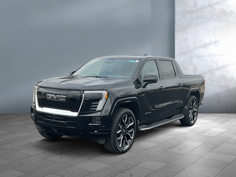 2025 GMC Sierra EV Extended Range Denali in Onyx Black — front three-quarter view
