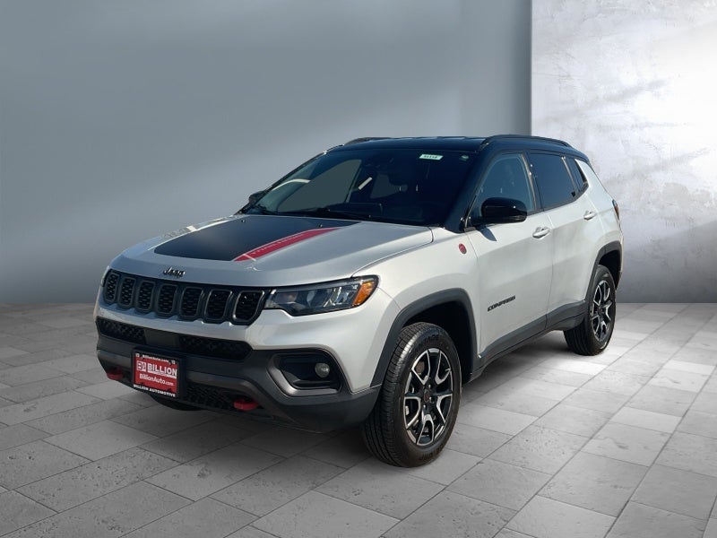 2025 Jeep Compass Trailhawk in Silver — front three-quarter view